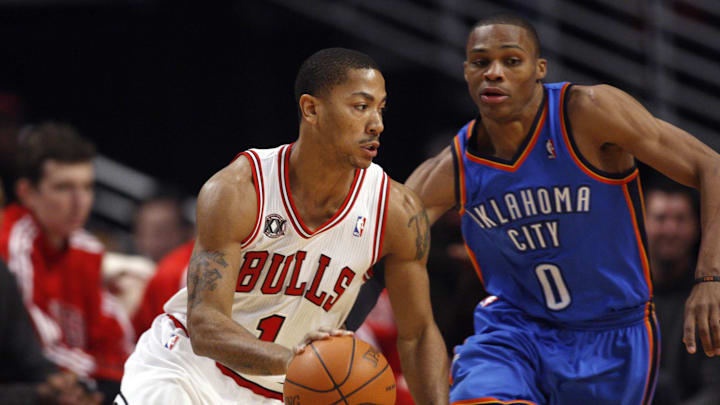 Dec 6, 2010; Chicago, IL, USA; Chicago Bulls point guard Derrick Rose (1) drives past Oklahoma City Thunder point guard Russell Westbrook (0) during the first quarter at the United Center. Mandatory Credit: Jerry Lai-Imagn Images Dec 6, 2010; Chicago, IL, USA; Chicago Bulls point guard Derrick Rose (1) drives past Oklahoma City Thunder point guard Russell Westbrook (0) during the first quarter at the United Center. Mandatory Credit: Jerry Lai-Imagn Images