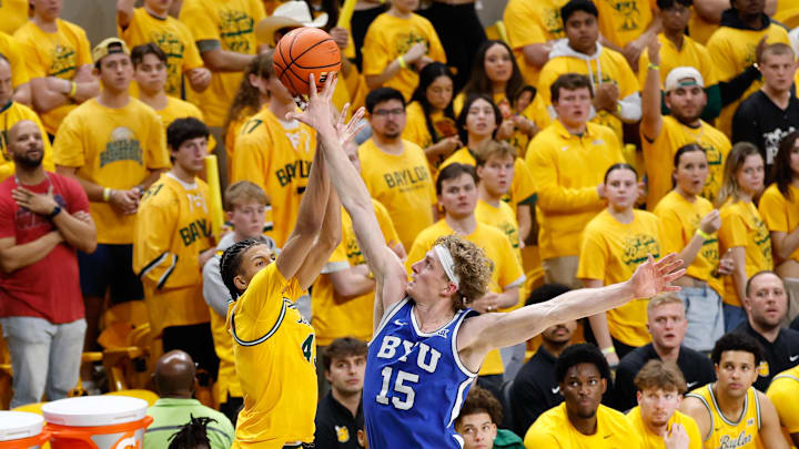  Baylor Bears guard Cameron Carr (43) has his shot blocked by BYU Cougars guard Richie Saunders