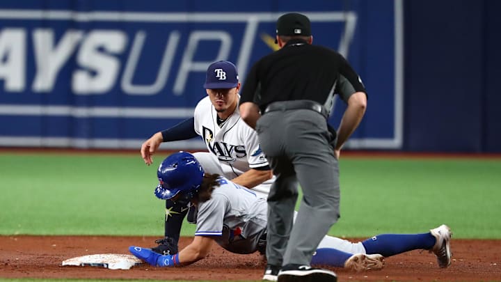 Aug 6, 2019; St. Petersburg, FL, USA; Toronto Blue Jays designated hitter Bo Bichette (11) is tagged out by Tampa Bay Rays shortstop Willy Adames (1) on a stolen base attempt during the third inning at Tropicana Field. Mandatory Credit: Kim Klement-Imagn Images Aug 6, 2019; St. Petersburg, FL, USA; Toronto Blue Jays designated hitter Bo Bichette (11) is tagged out by Tampa Bay Rays shortstop Willy Adames (1) on a stolen base attempt during the third inning at Tropicana Field. Mandatory Credit: Kim Klement-Imagn Images