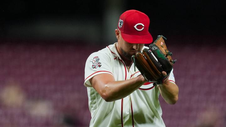 Apr 15, 2026; Cincinnati, Ohio, USA;  Cincinnati Reds pitcher Graham Ashcraft claps his hands as he walks to the dugout during the game against the San Francisco Giants in the eighth inning at Great American Ball Park. Players and coaches will wear No. 42 in honor of Jackie Robinson Day around the league. Mandatory Credit: Aaron Doster-Imagn Images