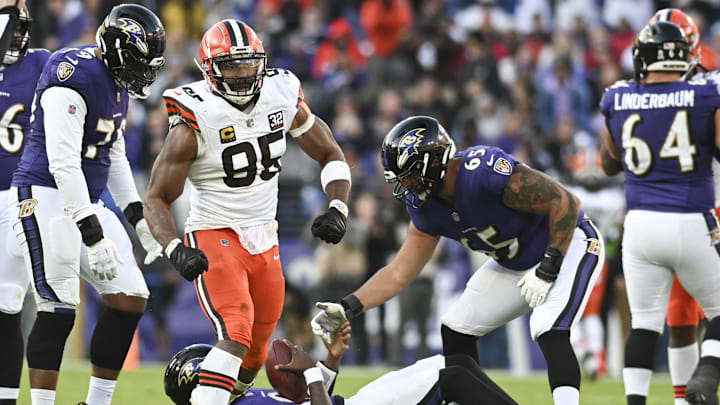 Nov 12, 2023; Baltimore, Maryland, USA; Cleveland Browns defensive end Myles Garrett (95) reacts after sacking Baltimore Ravens quarterback Lamar Jackson (8) during the second  half  at M&T Bank Stadium. Mandatory Credit: Tommy Gilligan-Imagn Images