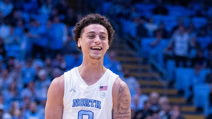 Dec 16, 2025; Chapel Hill, North Carolina, USA; North Carolina Tar Heels guard Kyan Evans (0) celebrates during the second half against the ETSU Buccaneers at Dean E. Smith Center. Mandatory Credit: Scott Kinser-Imagn Images