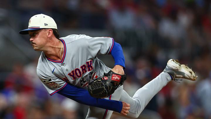 Jul 4, 2026; Cumberland, Georgia, USA; New York Mets pitcher Austin Warren (44) throws against the Atlanta Braves in the sixth inning at Truist Park. Mandatory Credit: Colin Hubbard-Imagn Images