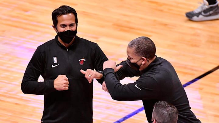 Jan 28, 2021; Miami, Florida, USA; Miami Heat head coach Erik Spoelstra elbow bumps LA Clippers head coach Tyronn Lue after the game at American Airlines Arena. Mandatory Credit: Jasen Vinlove-Imagn Images