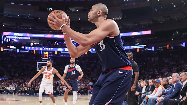 Mar 26, 2025; New York, New York, USA;  LA Clippers forward Nicolas Batum (33) takes a three point shot in the first quarter against the New York Knicks at Madison Square Garden. Mandatory Credit: Wendell Cruz-Imagn Images