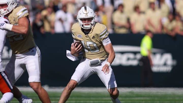 Oct 25, 2025; Atlanta, Georgia, USA; Georgia Tech Yellow Jackets quarterback Haynes King (10) runs the ball against the Syracuse Orange in the fourth quarter at Bobby Dodd Stadium at Hyundai Field. Mandatory Credit: Brett Davis-Imagn Images