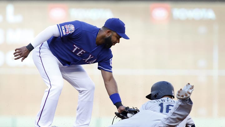 Seattle Mariners designated hitter Domingo Santana (16) steals second base against Texas Rangers shortstop Elvis Andrus (1) in the first inning at Globe Life Park in Arlington in 2019.