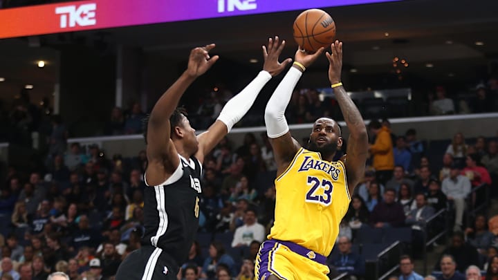 Mar 27, 2024; Memphis, Tennessee, USA; Los Angeles Lakers forward LeBron James (23) shoots as