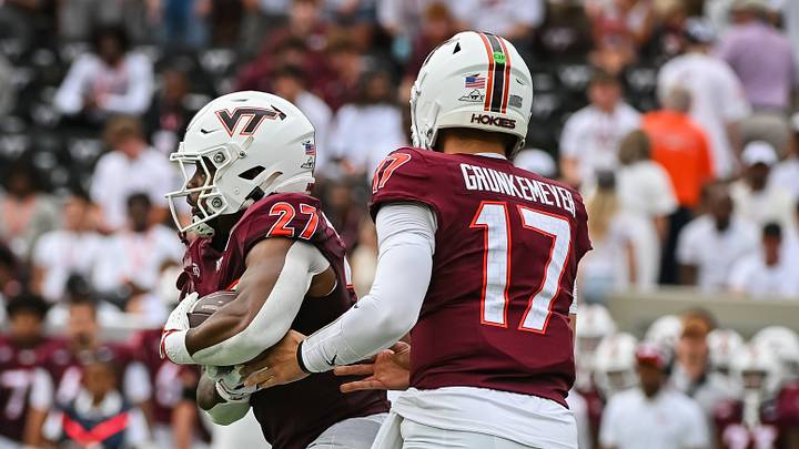Sep 12, 2026; Blacksburg, Virginia, USA; Virginia Tech Hokies quarterback Ethan Grunkemeyer (17) hands the ball off to running back Marcellous Hawkins Jr. (27) during the first quarter against the Old Dominion Monarchs at Lane Stadium. Mandatory Credit: Brian Bishop-Imagn Images Sep 12, 2026; Blacksburg, Virginia, USA; Virginia Tech Hokies quarterback Ethan Grunkemeyer (17) hands the ball off to running back Marcellous Hawkins Jr. (27) during the first quarter against the Old Dominion Monarchs at Lane Stadium. Mandatory Credit: Brian Bishop-Imagn Images
