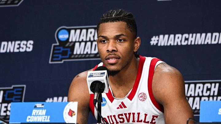Mar 19, 2026; Buffalo, NY, USA; Louisville Cardinals guard Ryan Conwell (3) speaks at a postgame press conference after the game against the South Florida Bulls during a first round game of the men's 2026 NCAA Tournament at Keybank Center.
