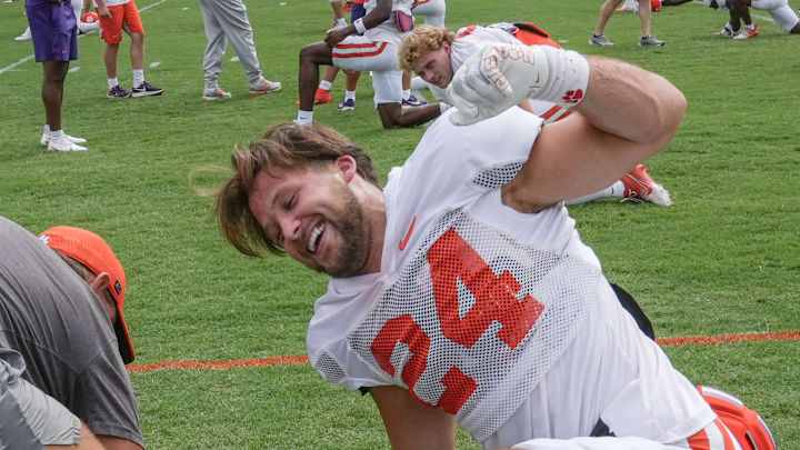 Clemson safety Tyler Venables (24) stretches during Clemson football 2025 practice at Jervey Meadows in Clemson, S.C. Wednesday, August 6, 2025.