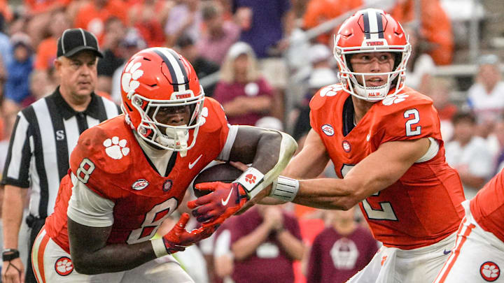 Clemson quarterback Cade Klubnik (2) fakes a handoff to wide receiver Adam Randall (8) before passing to wide receiver Bryant Wesco Jr. (12) for the go-ahead scoring drive, during the third quarter at Memorial Stadium in Clemson, S.C. Saturday, September 6, 2025.