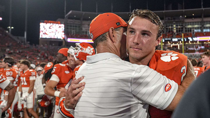 Clemson head coach Dabo Swinney hugs quarterback Cade Klubnik (2) after the game with Troy at Memorial Stadium Saturday, September 6, 2025 in Clemson, S.C.
