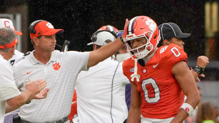Sep 20, 2025; Clemson, South Carolina, USA; Clemson Tigers head coach Dabo Swinney reacts with wide receiver Antonio Williams (0) after the offense did not get a first down against the Syracuse Orange in the fourth quarter at Memorial Stadium. Mandatory Credit: Ken Ruinard/GREENVILLE NEWS-USA TODAY Network via Imagn Images
