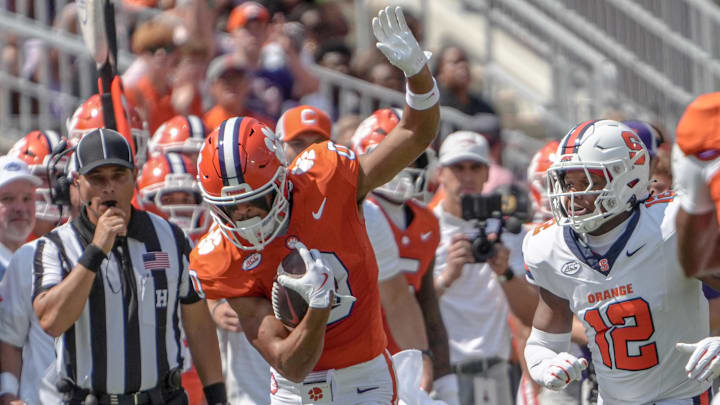 Sep 20, 2025; Clemson, South Carolina, USA; Clemson Tigers wide receiver Antonio Williams (0) is defended by Syracuse Orange defensive back Anwar Sparrow (12) during the first quarter at Memorial Stadium. Mandatory Credit: Ken Ruinard/GREENVILLE NEWS-USA TODAY Network via Imagn Images