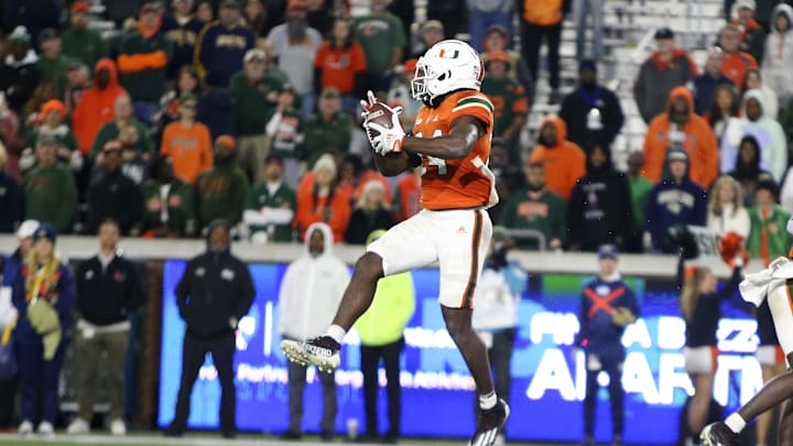 Nov 12, 2022; Atlanta, Georgia, USA; Miami Hurricanes safety Kamren Kinchens (24) intercepts a pass