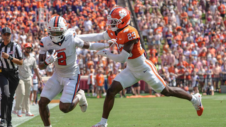 Clemson Tigers cornerback Ashton Hampton makes a tackle attempt during the first half against Syracuse at Memorial Stadium. Clemson Tigers cornerback Ashton Hampton makes a tackle attempt during the first half against Syracuse at Memorial Stadium.