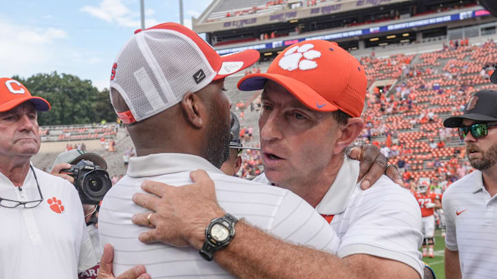 Sep 20, 2025; Clemson, South Carolina, USA; Clemson Tigers head coach Dabo Swinney congratulates Syracuse Orange head coach Fran Brown after their game at Memorial Stadium. Mandatory Credit: Ken Ruinard/GREENVILLE NEWS-USA TODAY Network via Imagn Images