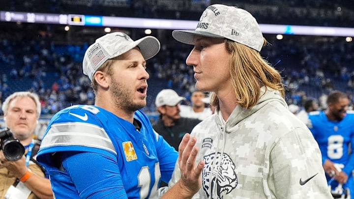 Detroit Lions quarterback Jared Goff (16) talks to Jacksonville Jaguars quarterback Trevor Lawrence (16) after 52-6 win at Ford Field in Detroit on Sunday, Nov. 17, 2024.