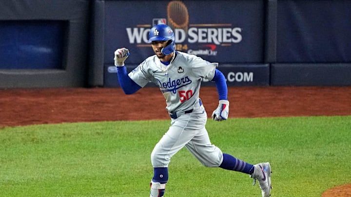 Los Angeles Dodgers shortstop Mookie Betts (50) celebrates after hitting a sacrifice fly during the eighth inning against the New York Yankees in game four of the 2024 MLB World Series at Yankee Stadium on Oct 30.