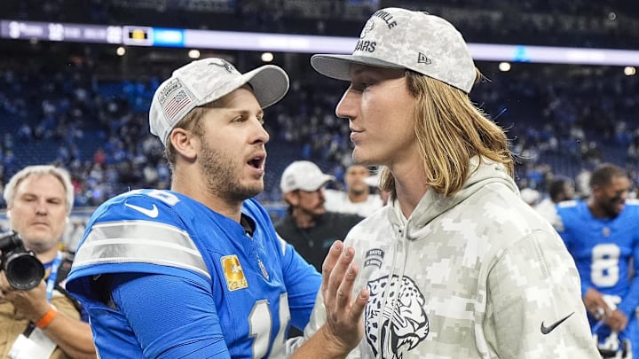 Nov 17, 2024; Detroit, MI, USA; Detroit Lions quarterback Jared Goff (16) talks to Jacksonville Jaguars quarterback Trevor Lawrence (16) after 52-6 win at Ford Field in Detroit on Sunday, Nov. 17, 2024. Mandatory Credit: Junfu Han/USA TODAY Network via Imagn Images 