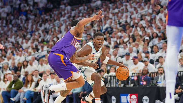 Apr 23, 2024; Minneapolis, Minnesota, USA; Minnesota Timberwolves guard Anthony Edwards (5) dribbles