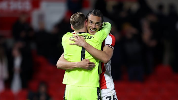 Ashley Phillips and his goalkeeper after a win and clean sheet