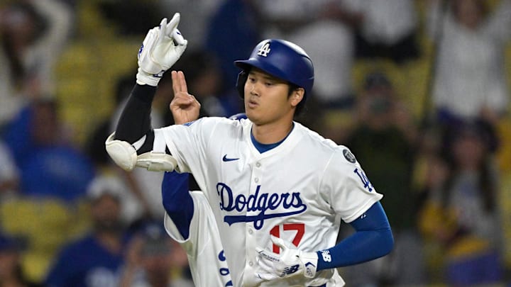 Jul 22, 2025; Los Angeles, California, USA;  Los Angeles Dodgers designated hitter Shohei Ohtani (17) rounds the bases on a two-run home run during the ninth inning against the Minnesota Twins at Dodger Stadium. Mandatory Credit: Jayne Kamin-Oncea-Imagn Images