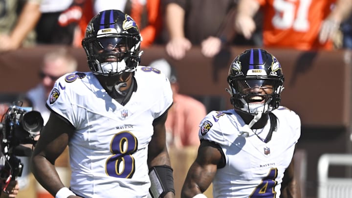 Oct 1, 2023; Cleveland, Ohio, USA; Baltimore Ravens quarterback Lamar Jackson (8) celebrates his rushing touchdown with wide receiver Zay Flowers (4) in the first quarter against the Cleveland Browns at Cleveland Browns Stadium. Mandatory Credit: David Richard-USA TODAY Sports Oct 1, 2023; Cleveland, Ohio, USA; Baltimore Ravens quarterback Lamar Jackson (8) celebrates his rushing touchdown with wide receiver Zay Flowers (4) in the first quarter against the Cleveland Browns at Cleveland Browns Stadium. Mandatory Credit: David Richard-USA TODAY Sports