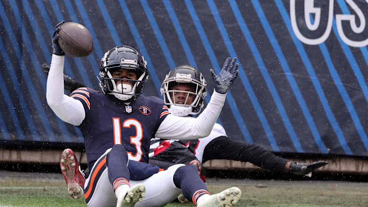 Dec 31, 2023; Chicago, Illinois, USA; Chicago Bears wide receiver Tyler Scott (13) reacts after making a touchdown catch that was called out of bounds against the Atlanta Falcons during the second half at Soldier Field. Mandatory Credit: Mike Dinovo-USA TODAY Sports