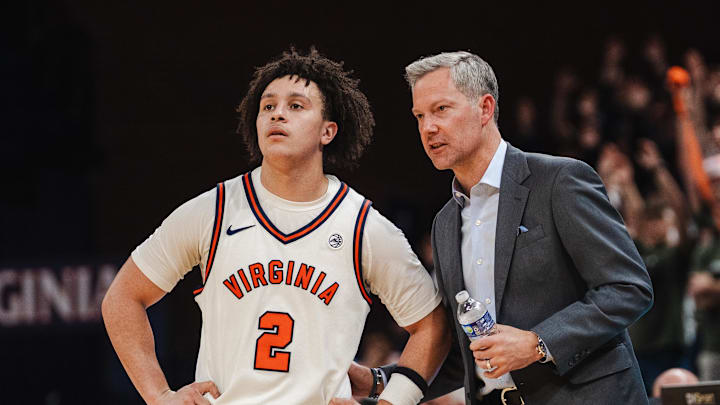 Feb 3, 2026; Charlottesville, Virginia, USA; Virginia Cavaliers guard Chance Mallory (2) talks with head coach Ryan Odom in the second half against the Pittsburgh Panthers at John Paul Jones Arena. Mandatory Credit: Emily Faith Morgan-Imagn Images