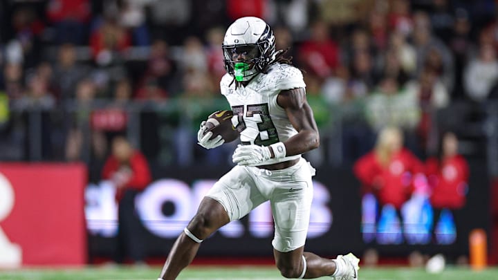 Piscataway, New Jersey, USA;  Oregon Ducks running back Dierre Hill Jr. (23) carries the ball  during the first half against the Rutgers Scarlet Knights at SHI Stadium.