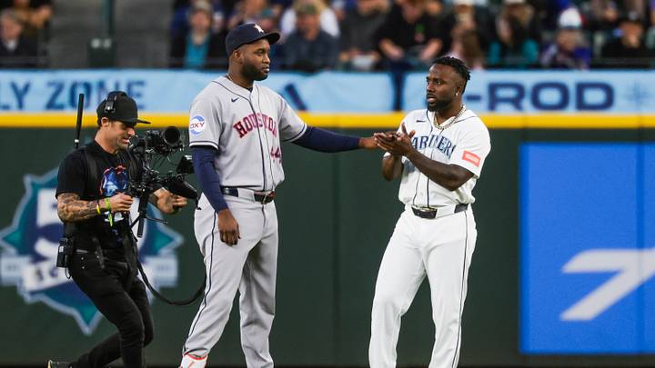 Sep 23, 2026; Seattle, Washington, USA; Houston Astros designated hitter Yordan Alvarez (44) talks with Seattle Mariners left fielder Randy Arozarena (56) before the first inning at T-Mobile Park. Mandatory Credit: Joe Nicholson-Imagn Images