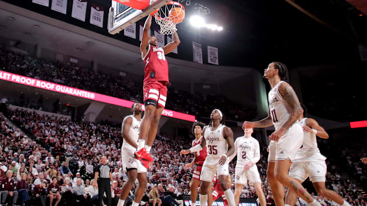 Jan 11, 2025; College Station, Texas, USA; Alabama Crimson Tide forward Derrion Reid (35) dunks against the Texas A&M Aggies during the second half at Reed Arena. Mandatory Credit: Erik Williams-Imagn Images