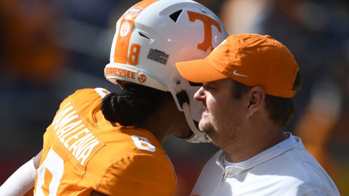 Tennessee quarterback Nico Iamaleava (8) hugs Tennessee head coach Josh Heupel before the Citrus Bowl NCAA College football game on Monday, January 1, 2024 in Orlando, Fla. between Tennessee and Iowa.