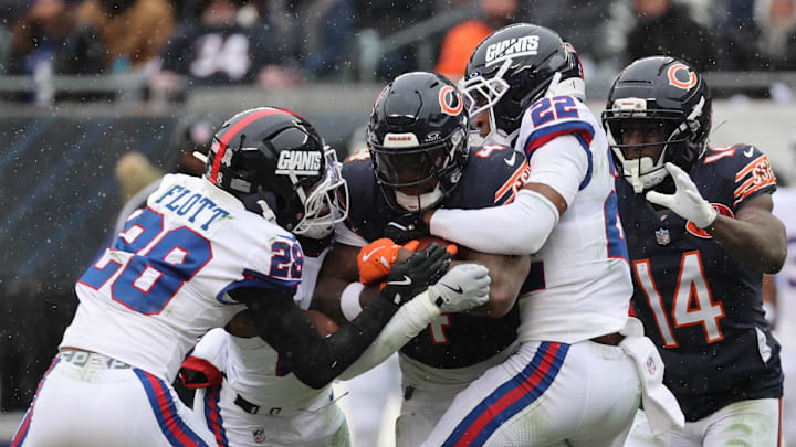 Nov 9, 2025; Chicago, Illinois, USA; Chicago Bears running back D'Andre Swift (4) rushes the ball during the second half at Soldier Field.  