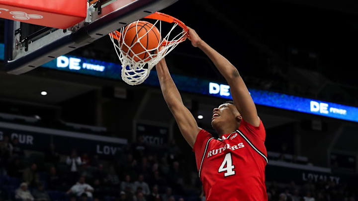 Jan 20, 2025; University Park, Pennsylvania, USA; Rutgers Scarlet Knights guard/forward Ace Bailey (4) dunks the ball during the second half against the Penn State Nittany Lions at Bryce Jordan Center. Penn State defeated Rutgers 80-72. Mandatory Credit: Matthew O'Haren-Imagn Images