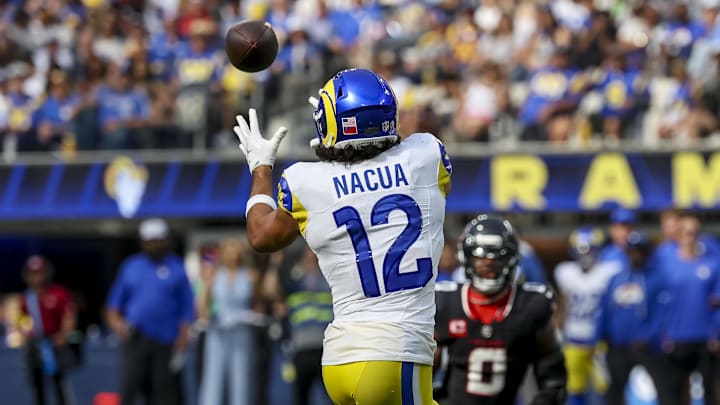 Sep 7, 2025; Inglewood, California, USA; Los Angeles Rams wide receiver Puka Nacua (12) catches a pass during the fourth quarter at SoFi Stadium. Mandatory Credit: Kiyoshi Mio-Imagn Images