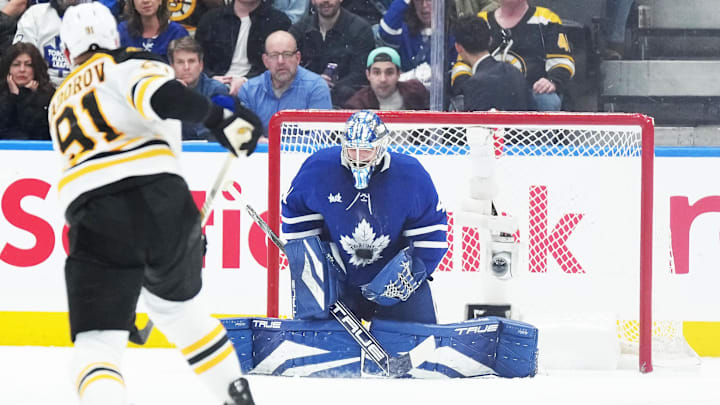 Nov 5, 2024; Toronto, Ontario, CAN; Toronto Maple Leafs goaltender Anthony Stolarz (41) stops the puck shot by Boston Bruins defenseman Nikita Zadorov (91) during the third period at Scotiabank Arena. Mandatory Credit: Nick Turchiaro-Imagn Images