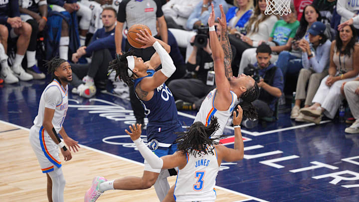May 24, 2025; Minneapolis, Minnesota, USA; Minnesota Timberwolves guard Terrence Shannon Jr. (00) shoots the ball against the Oklahoma City Thunder during the second half in game three of the western conference finals for the 2025 NBA Playoffs at Target Center. Mandatory Credit: Brad Rempel-Imagn Images