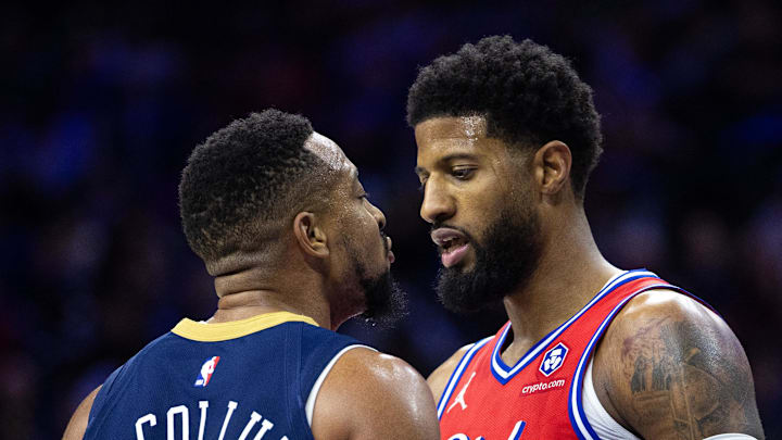 Jan 10, 2025; Philadelphia, Pennsylvania, USA; New Orleans Pelicans guard CJ McCollum (L) and Philadelphia 76ers forward Paul George (R) have words during the third quarter at Wells Fargo Center. Jan 10, 2025; Philadelphia, Pennsylvania, USA; New Orleans Pelicans guard CJ McCollum (L) and Philadelphia 76ers forward Paul George (R) have words during the third quarter at Wells Fargo Center.