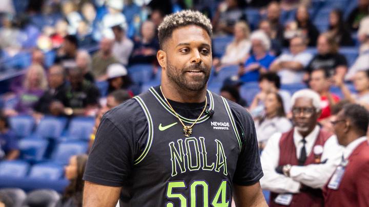 Mar 29, 2026; New Orleans, Louisiana, USA;  New Orleans Saints defensive end Cam Jordan looks on against the Houston Rockets during the first half at Smoothie King Center. Mandatory Credit: Stephen Lew-Imagn Images