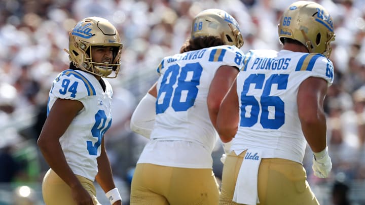 Oct 5, 2024; University Park, Pennsylvania, USA; UCLA Bruins kicker Mateen Bhaghani (94) reacts after kicking a field goal during the second quarter against the Penn State Nittany Lions at Beaver Stadium. Mandatory Credit: Matthew O'Haren-Imagn Images