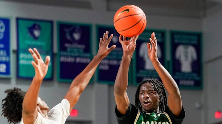Grayson Rams guard Caleb Holt (3) shoots the ball during the second quarter of a City of Palms Classic quarterfinal game against the Columbus Explorers at Suncoast Credit Union Arena in Fort Myers, Fla., on Friday, Dec. 20, 2024.