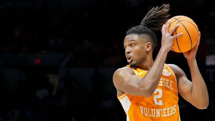 Houston Cougars guard Emanuel Sharp (21) guards Tennessee Volunteers guard Chaz Lanier (2) during the first half of a game Sunday, March 30, 2025, during the Elite Eight round of the NCAA March Madness tournament at Lucas Oil Stadium in Indianapolis. Houston defeated Tennessee 69-50. Houston Cougars guard Emanuel Sharp (21) guards Tennessee Volunteers guard Chaz Lanier (2) during the first half of a game Sunday, March 30, 2025, during the Elite Eight round of the NCAA March Madness tournament at Lucas Oil Stadium in Indianapolis. Houston defeated Tennessee 69-50.