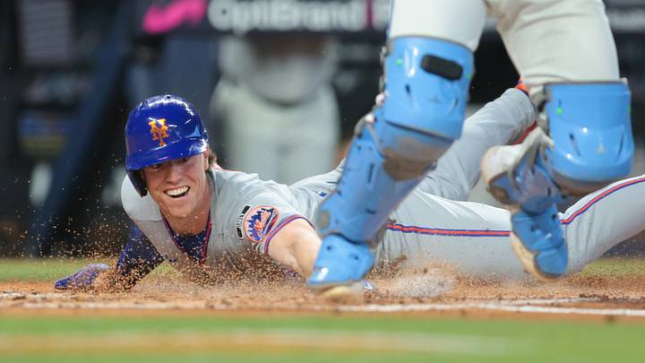 Sep 7, 2026; Miami, Florida, USA; New York Mets third baseman Brett Baty (7) dives at home plate and scores against the Miami Marlins during the second inning at loanDepot Park. Mandatory Credit: Sam Navarro-Imagn Images Sep 7, 2026; Miami, Florida, USA; New York Mets third baseman Brett Baty (7) dives at home plate and scores against the Miami Marlins during the second inning at loanDepot Park. Mandatory Credit: Sam Navarro-Imagn Images