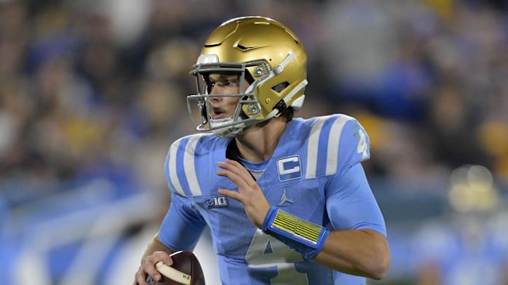 Nov 8, 2024; Pasadena, California, USA;   UCLA Bruins quarterback Ethan Garbers (4) looks to pass in the first half against the Iowa Hawkeyes at the Rose Bowl. Mandatory Credit: Jayne Kamin-Oncea-Imagn Images
