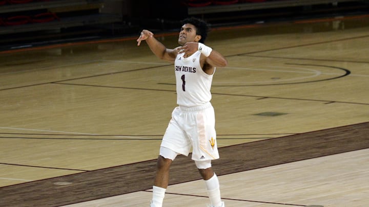 Feb 27, 2021; Tempe, AZ, USA; Arizona State Sun Devils guard Remy Martin (1) celebrates his game winning shot against the Washington State Cougars during overtime at Desert Financial Arena. Mandatory Credit: Joe Camporeale-Imagn Images