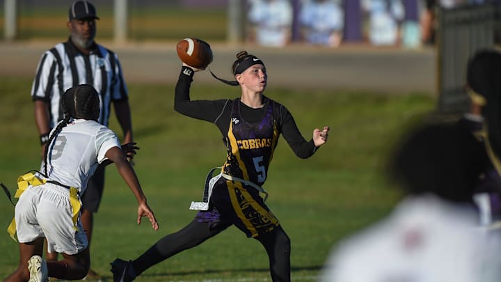 Fort Pierce Central High School's Adrienne Rivera (5) fires off a pass while Fort Pierce Westwood moves in during their flag football game at Fort Pierce Central High School on Thursday, March 23, 2023, in Fort Pierce. Westwood won 7-6.

Tcn Fpc Girls Football 01