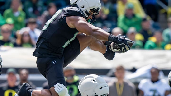 Combat Ducks tight end Kenyon Sadiq looks like a comic book hero on the football field sometimes. He does other-worldly, no-kryptonite stuff.